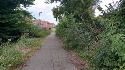 Photograph of the route from Chells Lane to Knights Templar Green