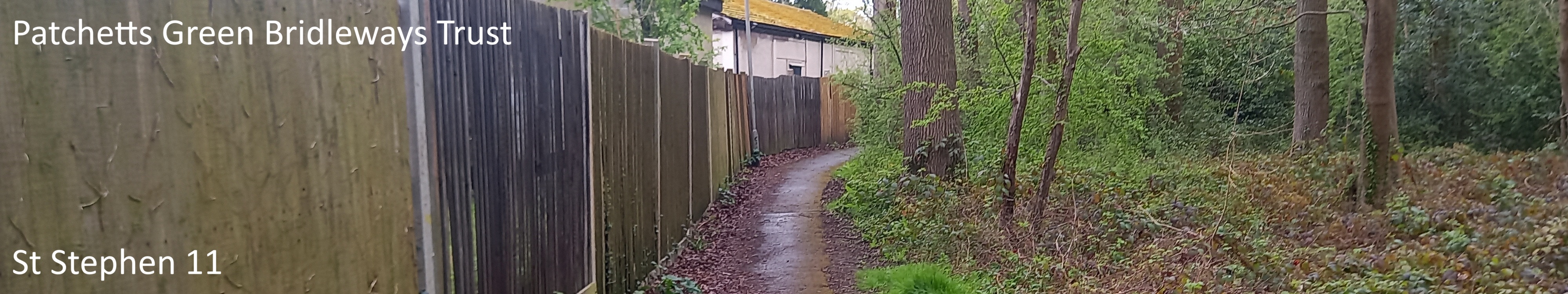 image of St Stephen 11 bridleway taken in 2025 showing path with fence to one side and trees to the other